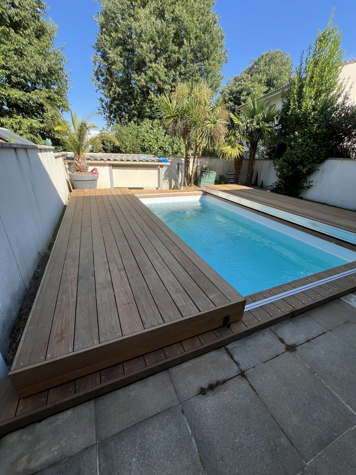 Habillage d’un Rolling Deck de Piscine en bois exotique